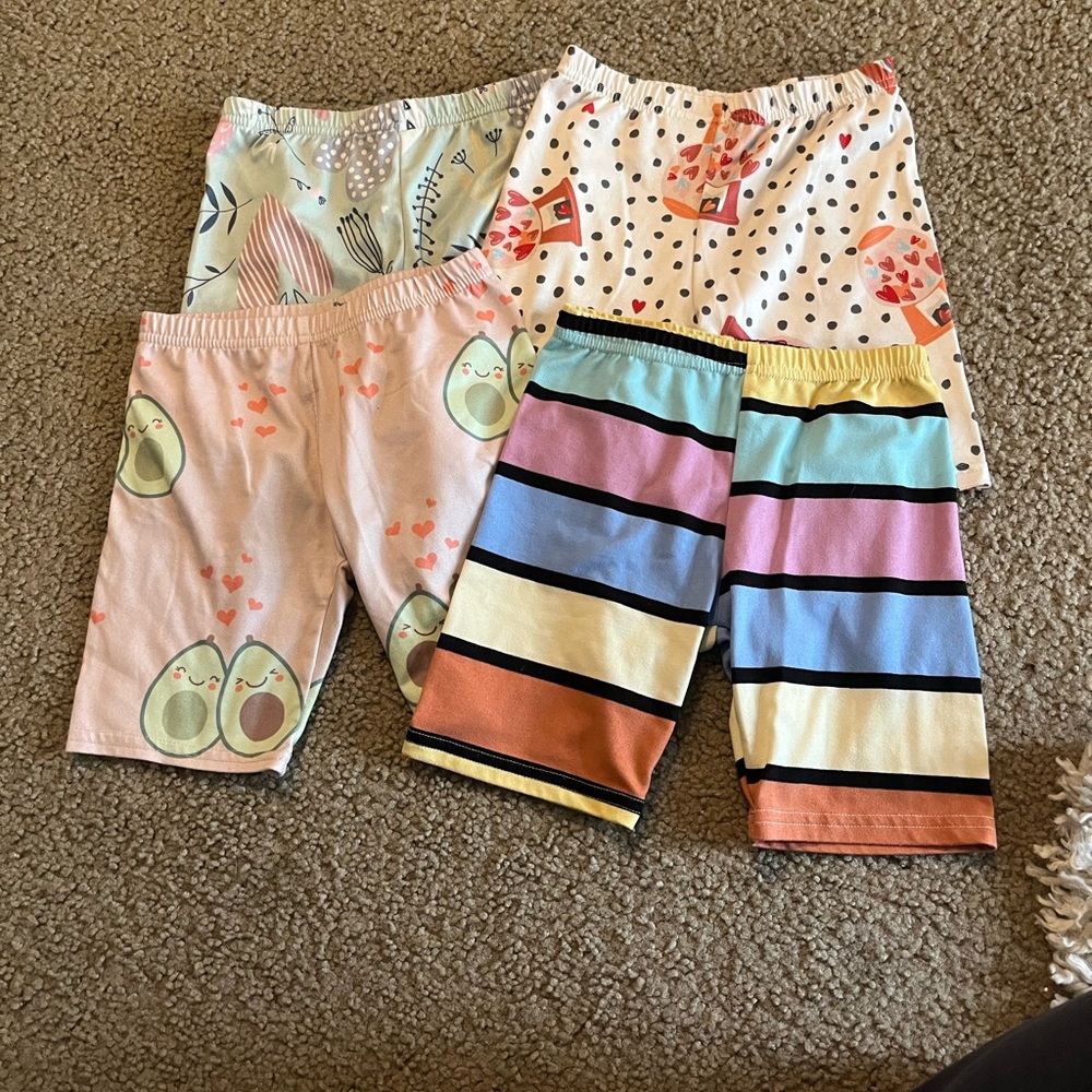4 pairs of Dot Dot Smile kick shorts